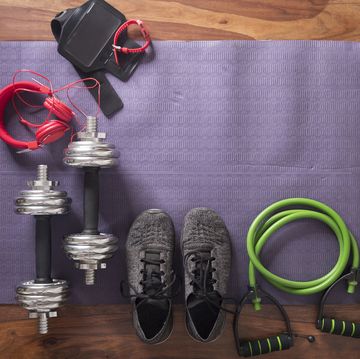 flat lay image of fitness equipment on yoga mat