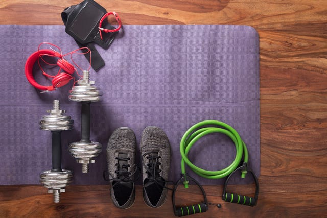 flat lay image of fitness equipment on yoga mat