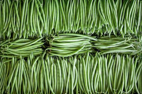 flat lay of fresh french beans oedered in a row in a crate, kigali, municipality of kigali, rwanda