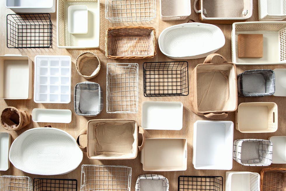 flat lay of marie kondo's storage boxes, containers and baskets with different sizes and shapes