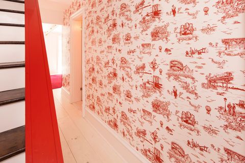red wallpaper in entryway