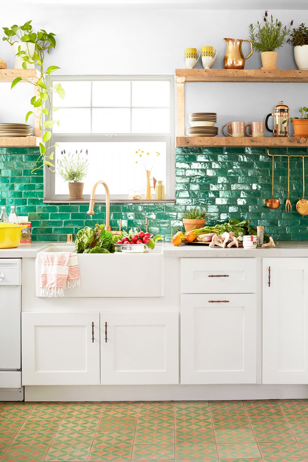 kitchen with green tile backsplash