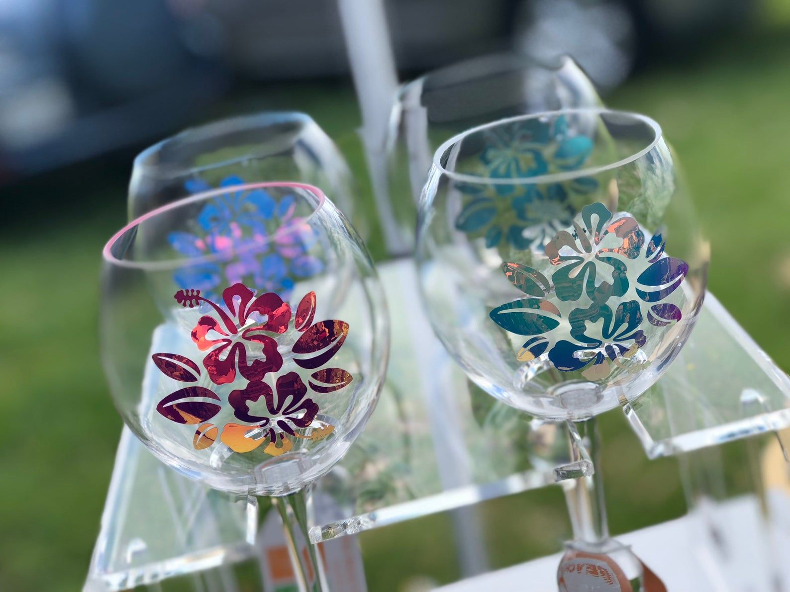 https://hips.hearstapps.com/hmg-prod/images/floating-wine-glasses-hibiscus-wine-glass-1591292929.jpg