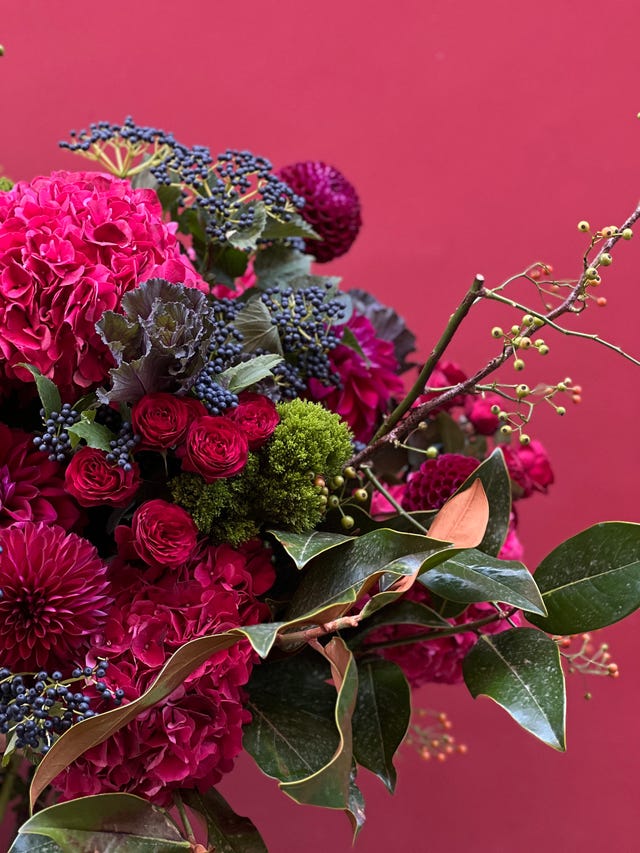 Aromatic Red Roses and Berries Centerpiece