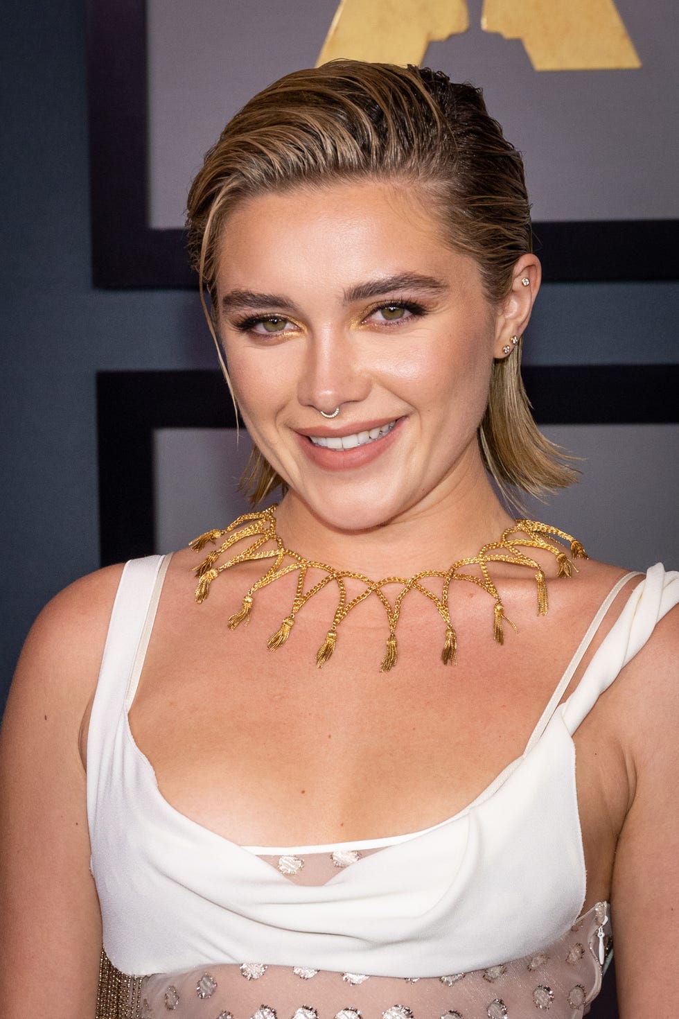 Florence Pugh Stuns in See-Through Metallic White Dress