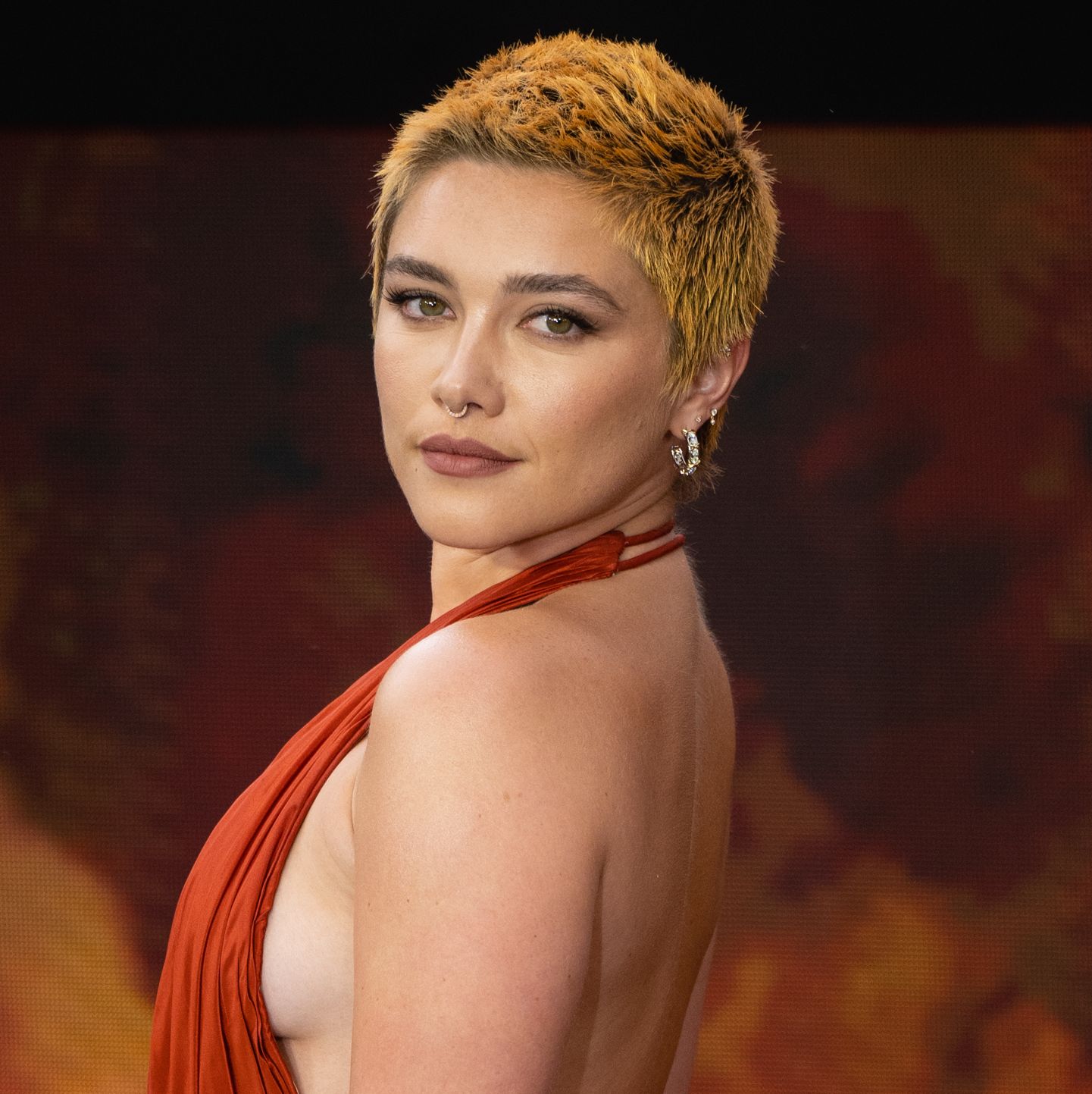 Florence Pugh Looks Back on *That* Sheer Valentino Dress and Opens Up About Refusing to Hide Her Body