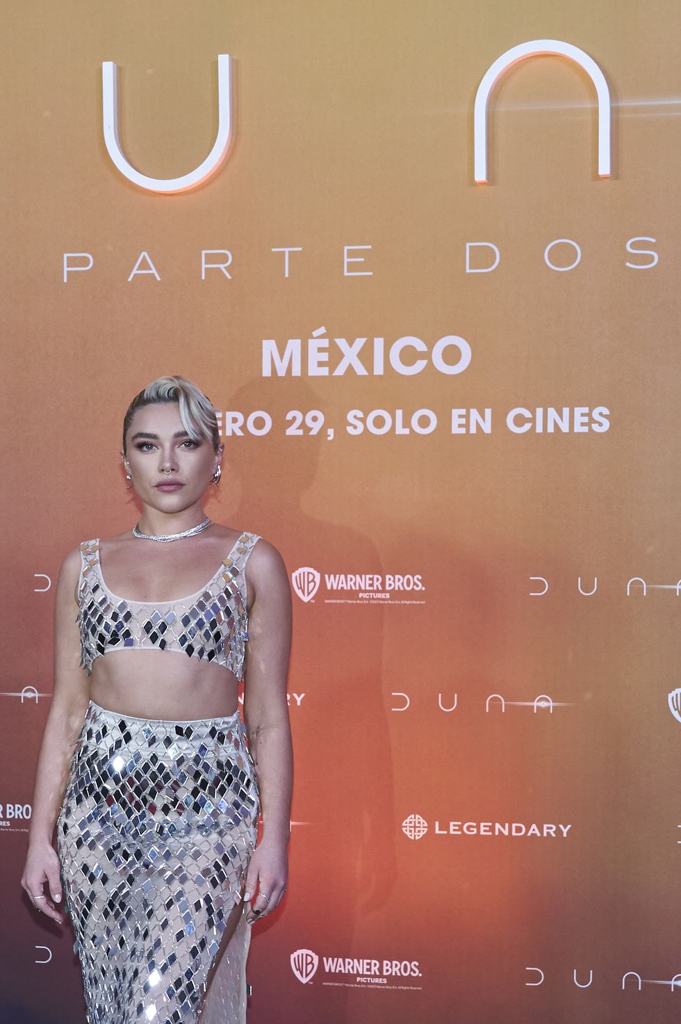 florence pugh wearing a see through crop top at the dune part two photocall