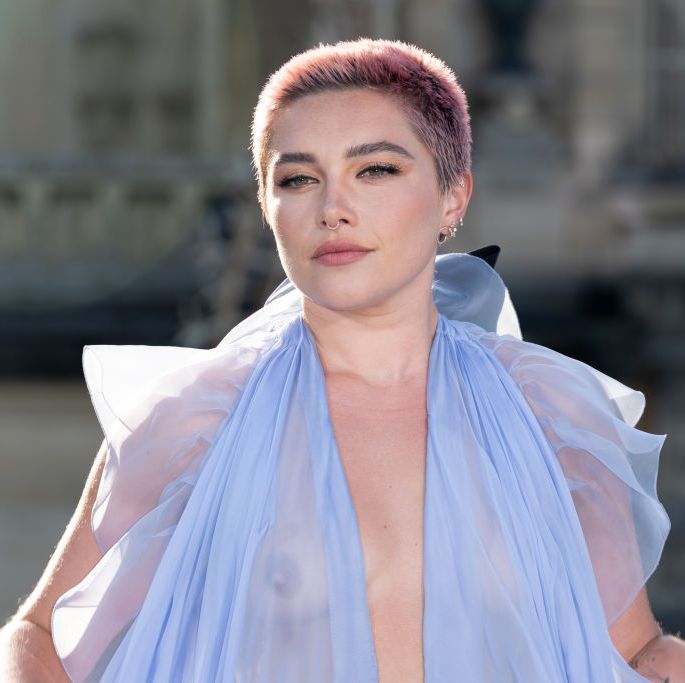 florence pugh attends the valentino haute couture show 2023 in sheer blue valentino dress