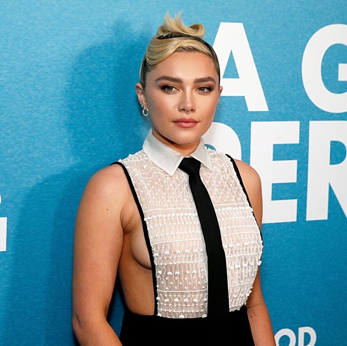 Florence Pugh wears an underboob-baring shirt and tie