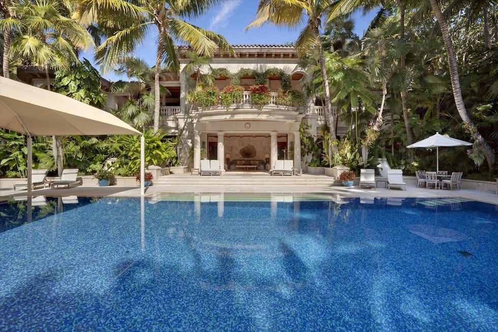 Swimming pool, Property, Real estate, Resort, Azure, Shade, Arecales, Reflection, Composite material, Villa, 