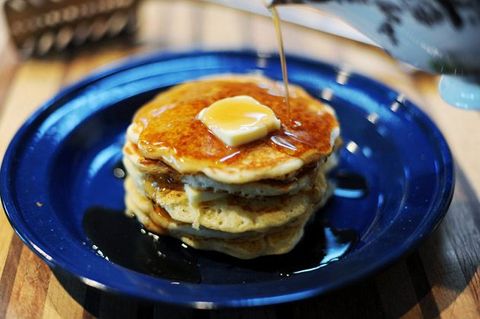 pancakes stacked with butter and syrup
