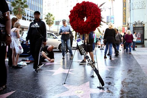 Flowers Placed On The Hollywood Walk Of Fame Star Of Producer Robert Evans