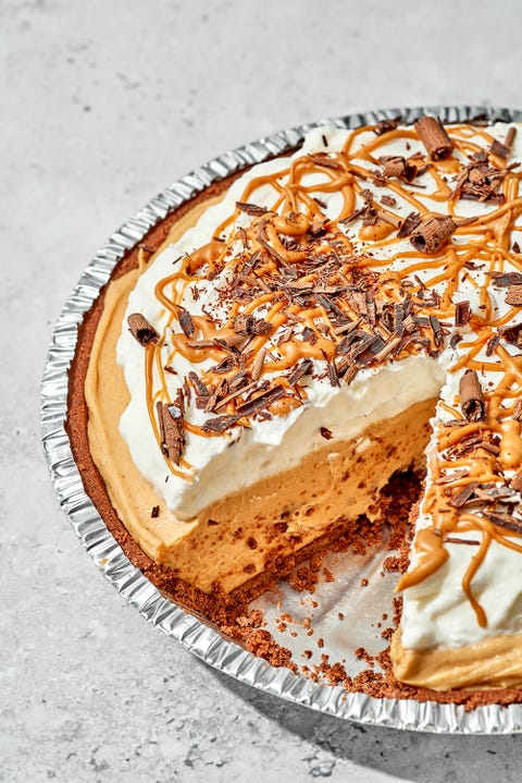 fluffernutter pie in a metal pie tin with a slice taken out fluffernutter pie in a metal pie tin with a slice taken out