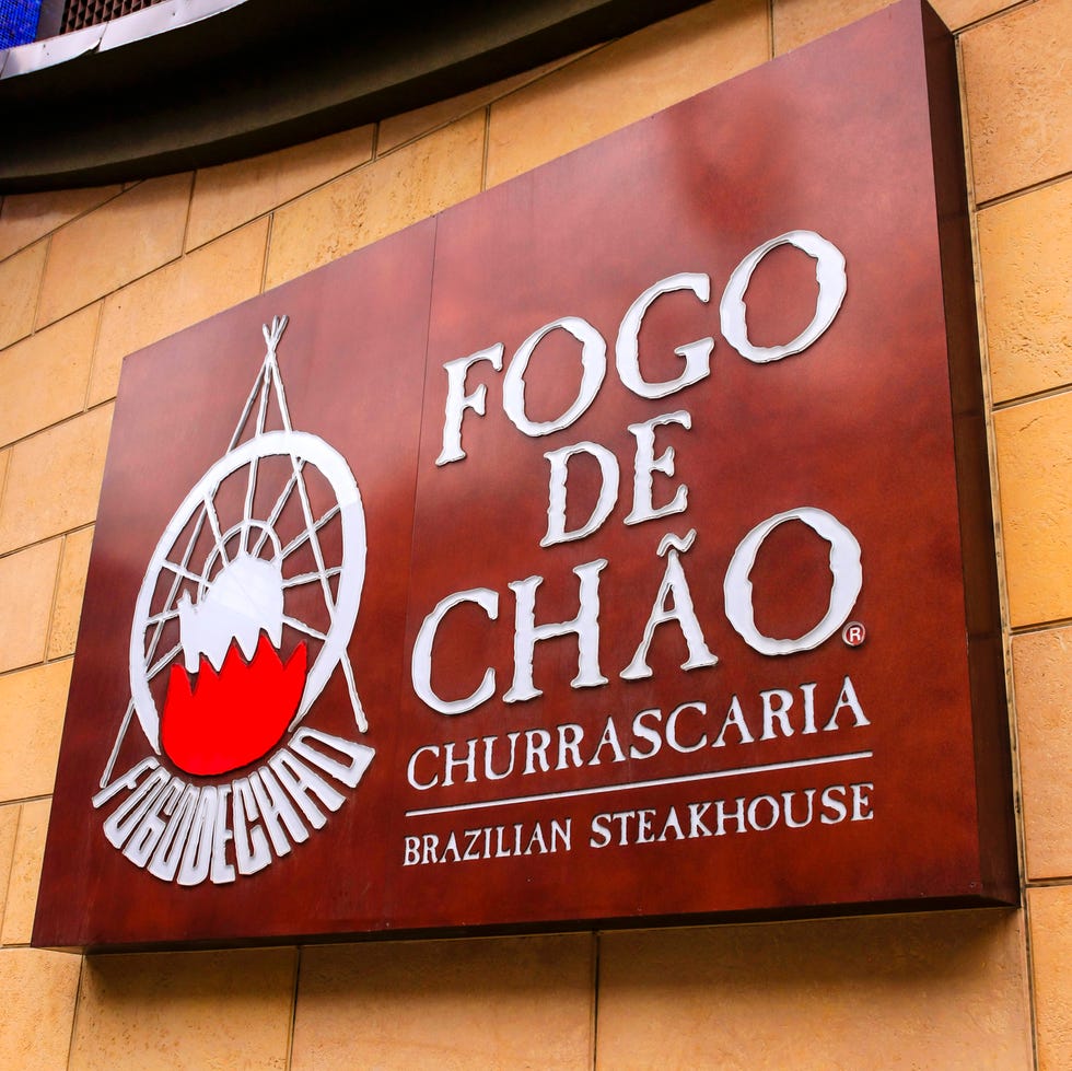 minneapolis, mn, usa   july 26, 2015 fogo de chao brazillian steakhouse restaurant wall sign on s 7th street in minneapolis mn