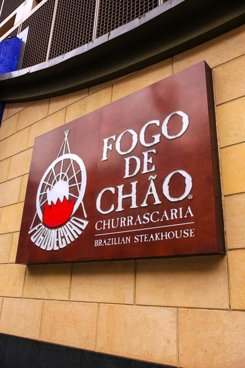 minneapolis, mn, usa   july 26, 2015 fogo de chao brazillian steakhouse restaurant wall sign on s 7th street in minneapolis mn