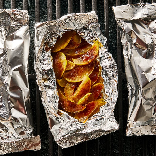 apples dusted in cinnamon in foil packs