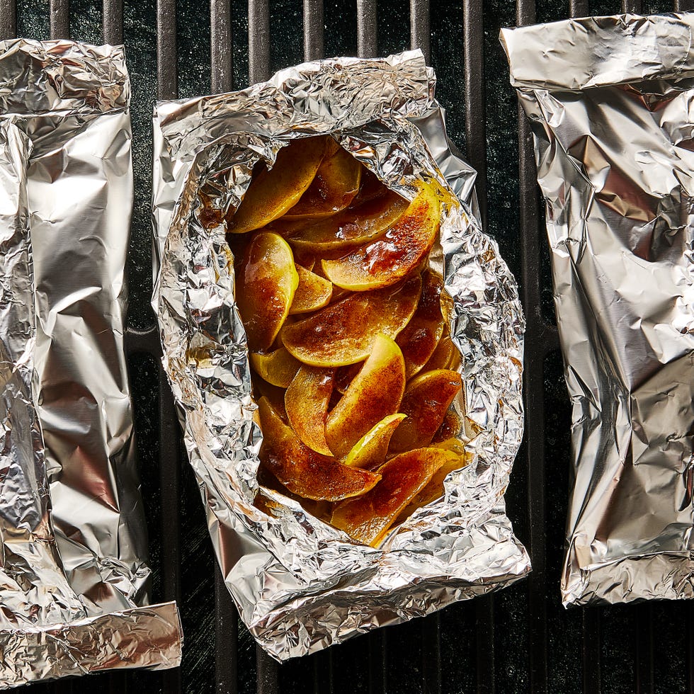 apples dusted in cinnamon in foil packs