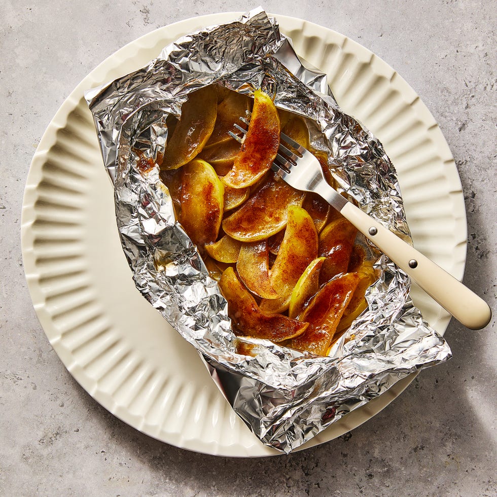 apples dusted in cinnamon in foil packs