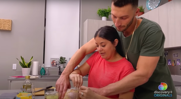 a couple preparing a meal