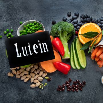 foods high in lutein on dark background