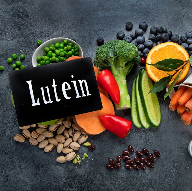 foods high in lutein on dark background
