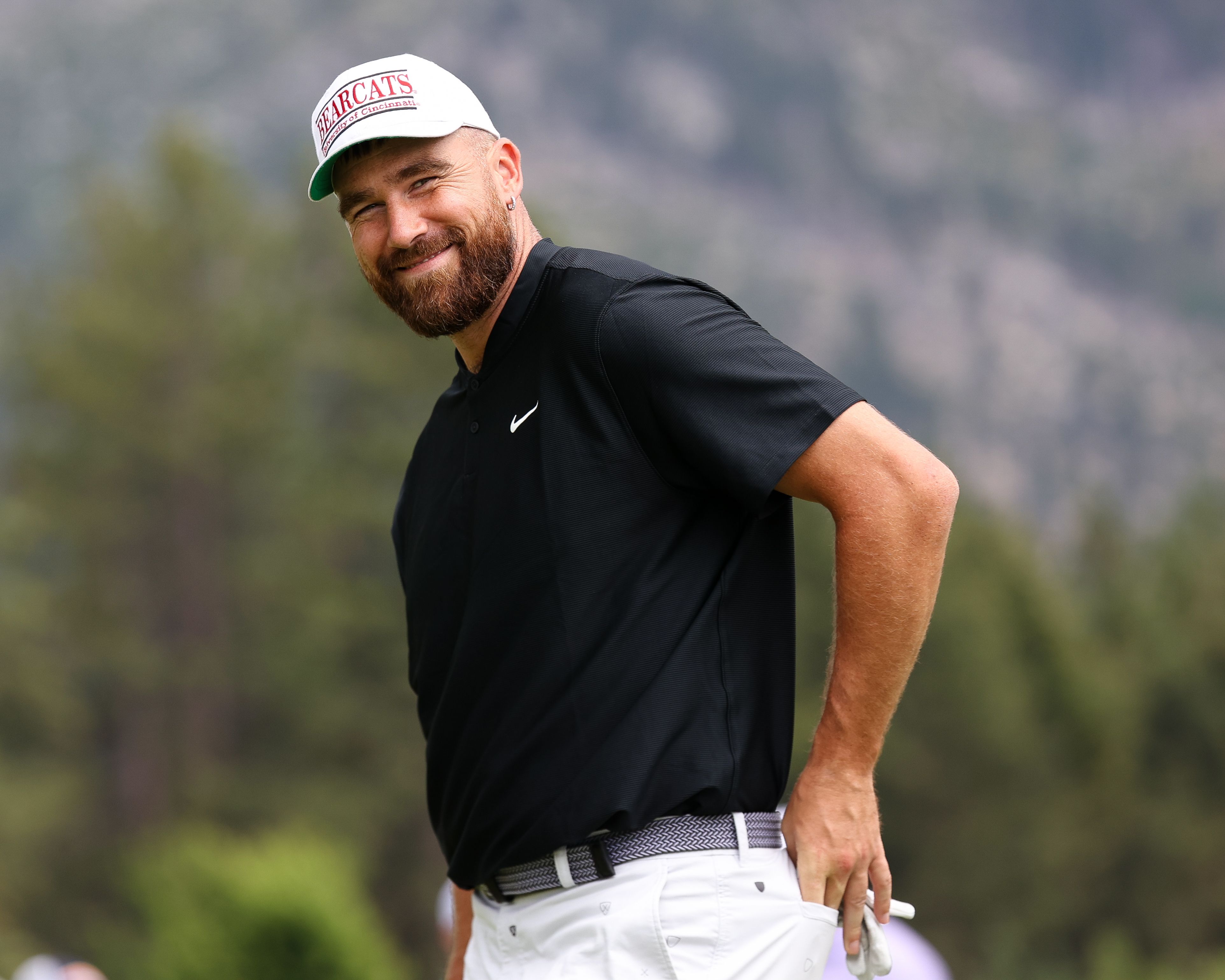 Travis Kelce Reacts to Fan's Taylor Swift Joke After Terrible Golf Swing