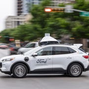 Ford 5th Generation Autonomous Vehicle street testing a fifth generation ford autonomous test vehicle drives on a street