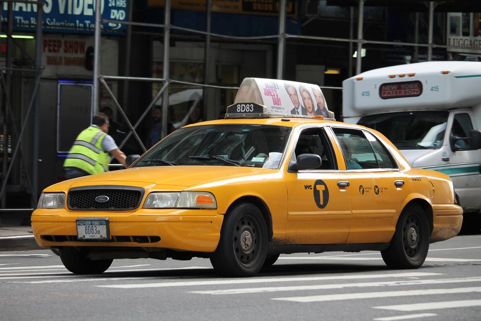 new york city ford crown victoria taxi cab in midtown manhattan