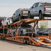 ford f 150 lightning pickups on carrier