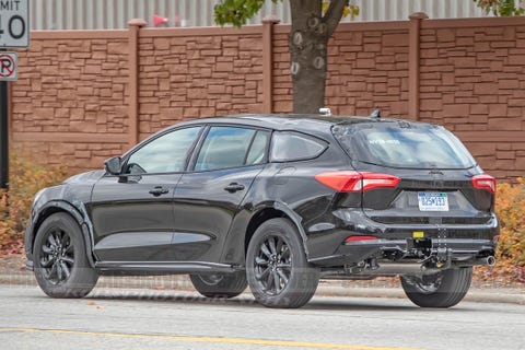 Next Ford Fusion Takes Shape as a Subaru Outback–Style Lifted Wagon