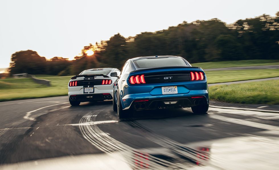 Land vehicle, Vehicle, Car, Automotive design, Performance car, Shelby mustang, Boss 302 mustang, Mid-size car, Road, Rolling, 