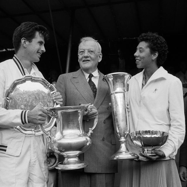 Althea Gibson and Ashley Cooper with Trophies