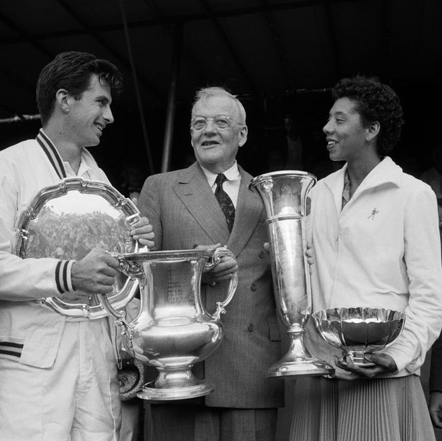 Althea Gibson and Ashley Cooper with Trophies