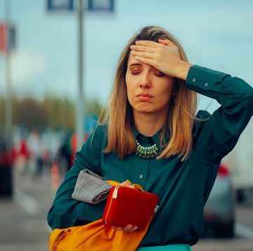 forgetful woman checking her bag losing her money