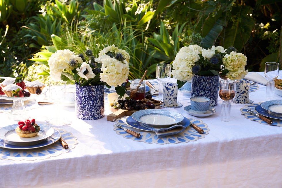 a table with plates and glasses