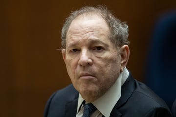 harvey weinstein wearing a suit and tie and looking ahead in a court room