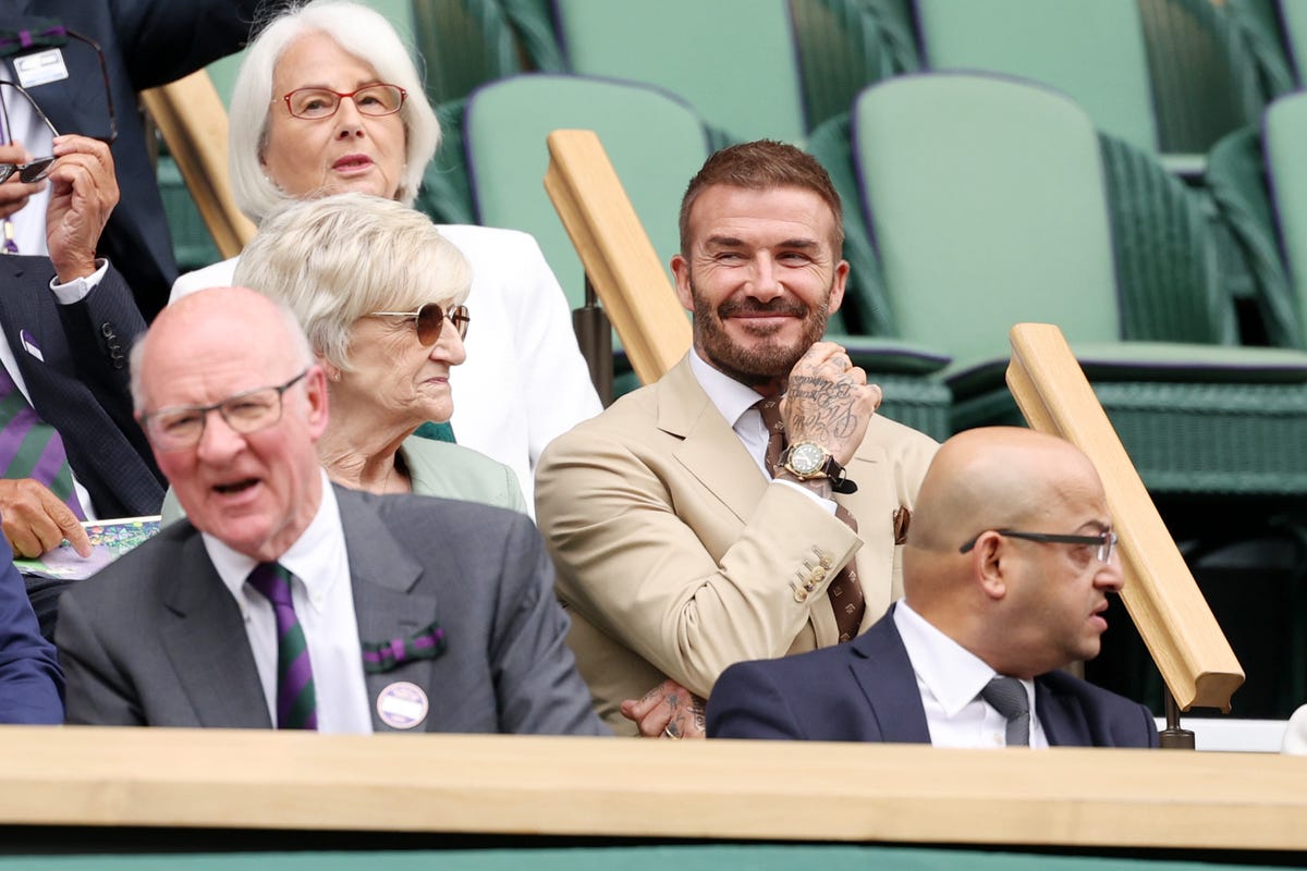 former-footballer-david-beckham-watches-on-with-his-mother-news-photo-1689679582.jpg