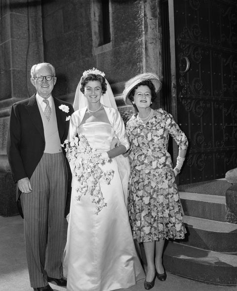 jean ann kennedy with her parents on her wedding day