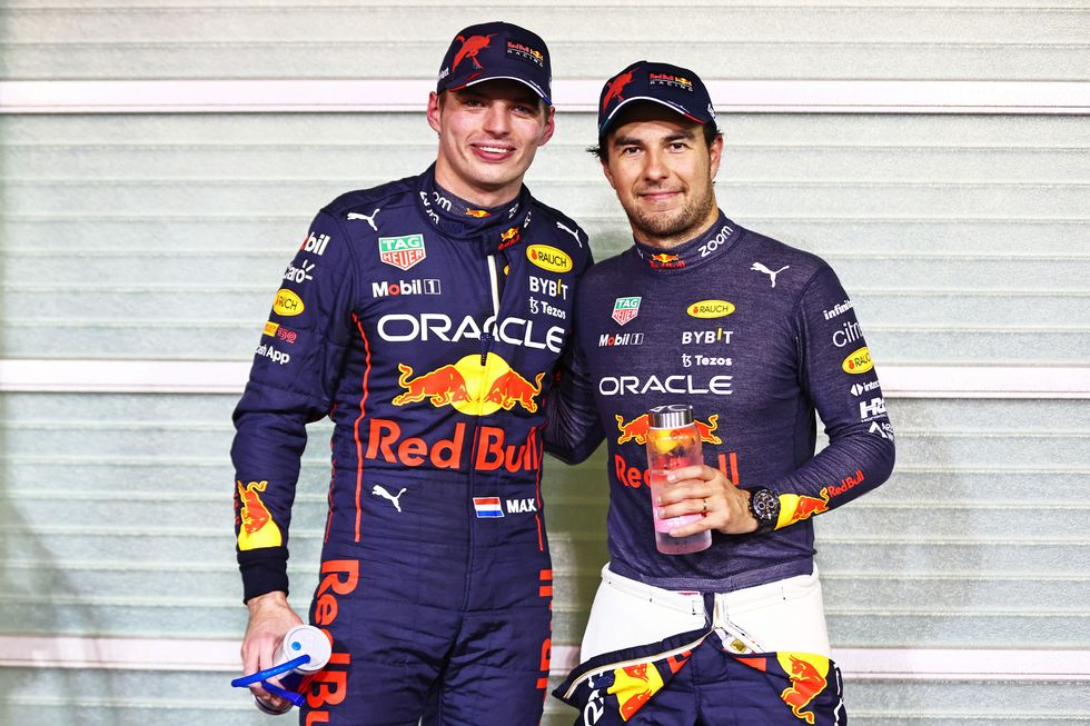 formula 1 drivers max verstappen and sergio 'checo' perez celebrate together