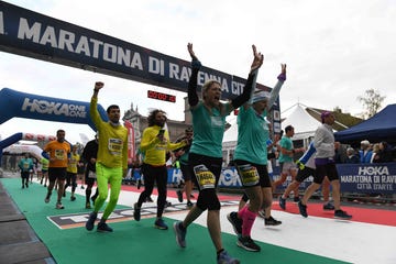 Participants crossing the finish line at a marathon event