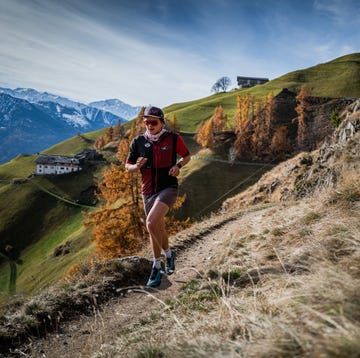 a man running on a trail