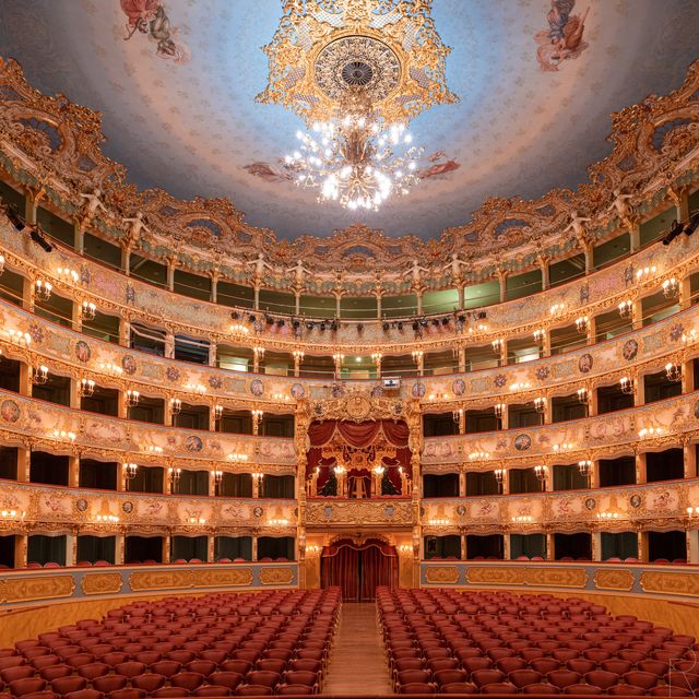 a large building with a large dome with la fenice in the background