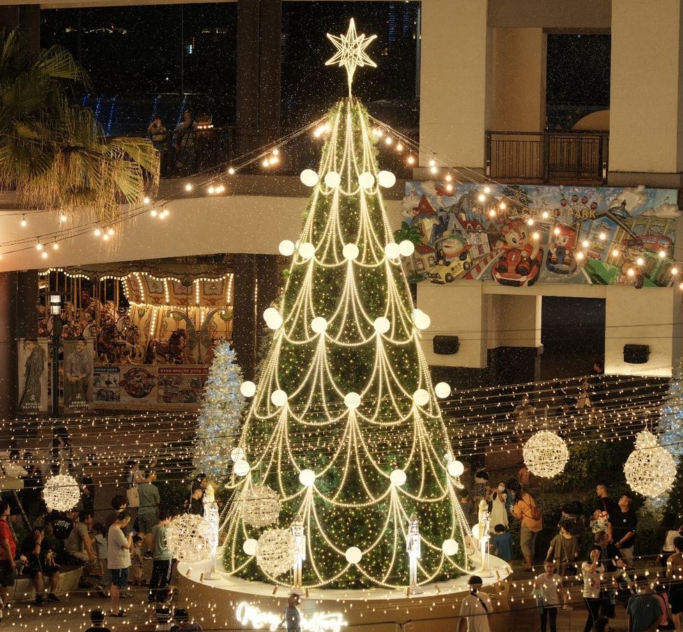 a large christmas tree in a building