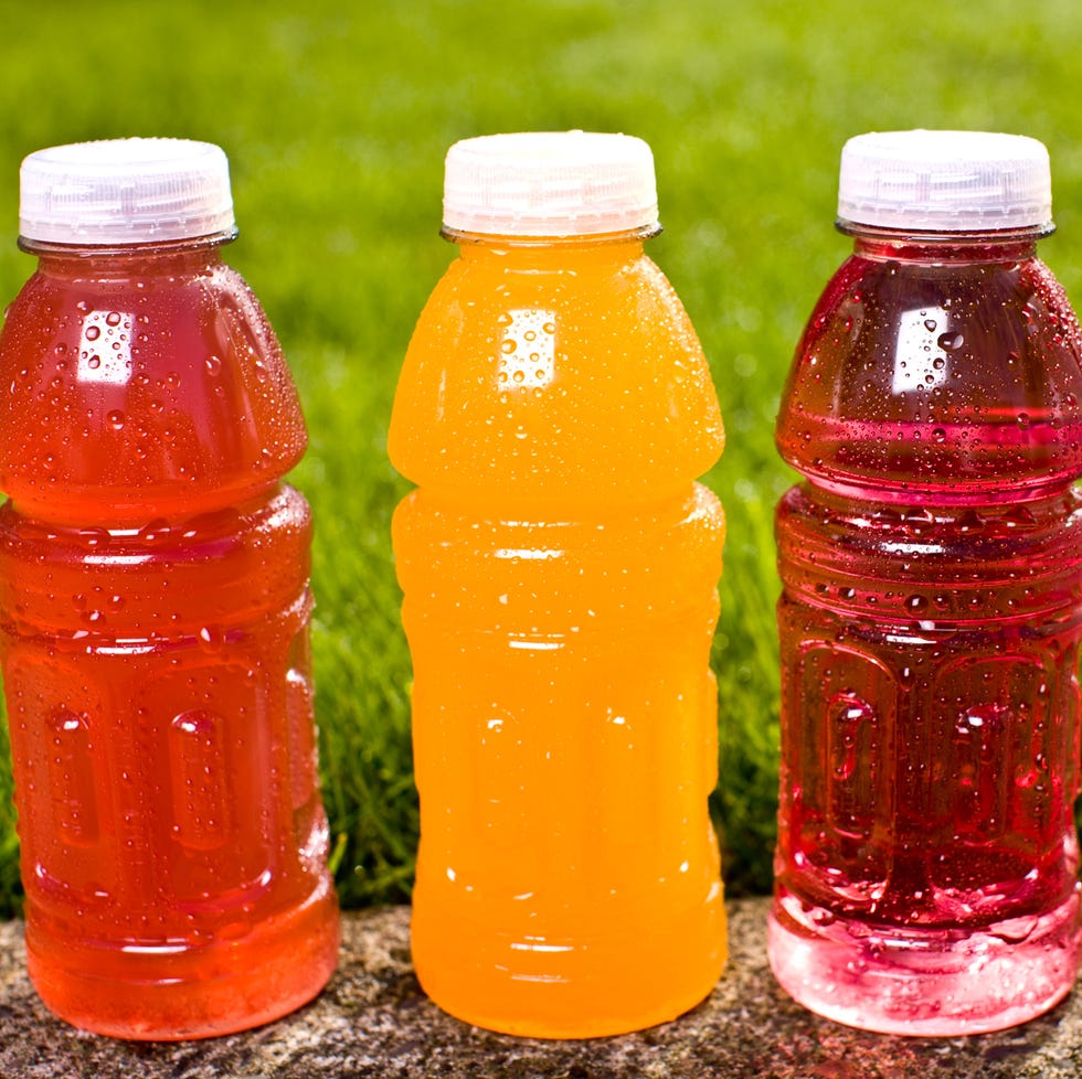 four multi colored sports drinks four multi colored sports drinks