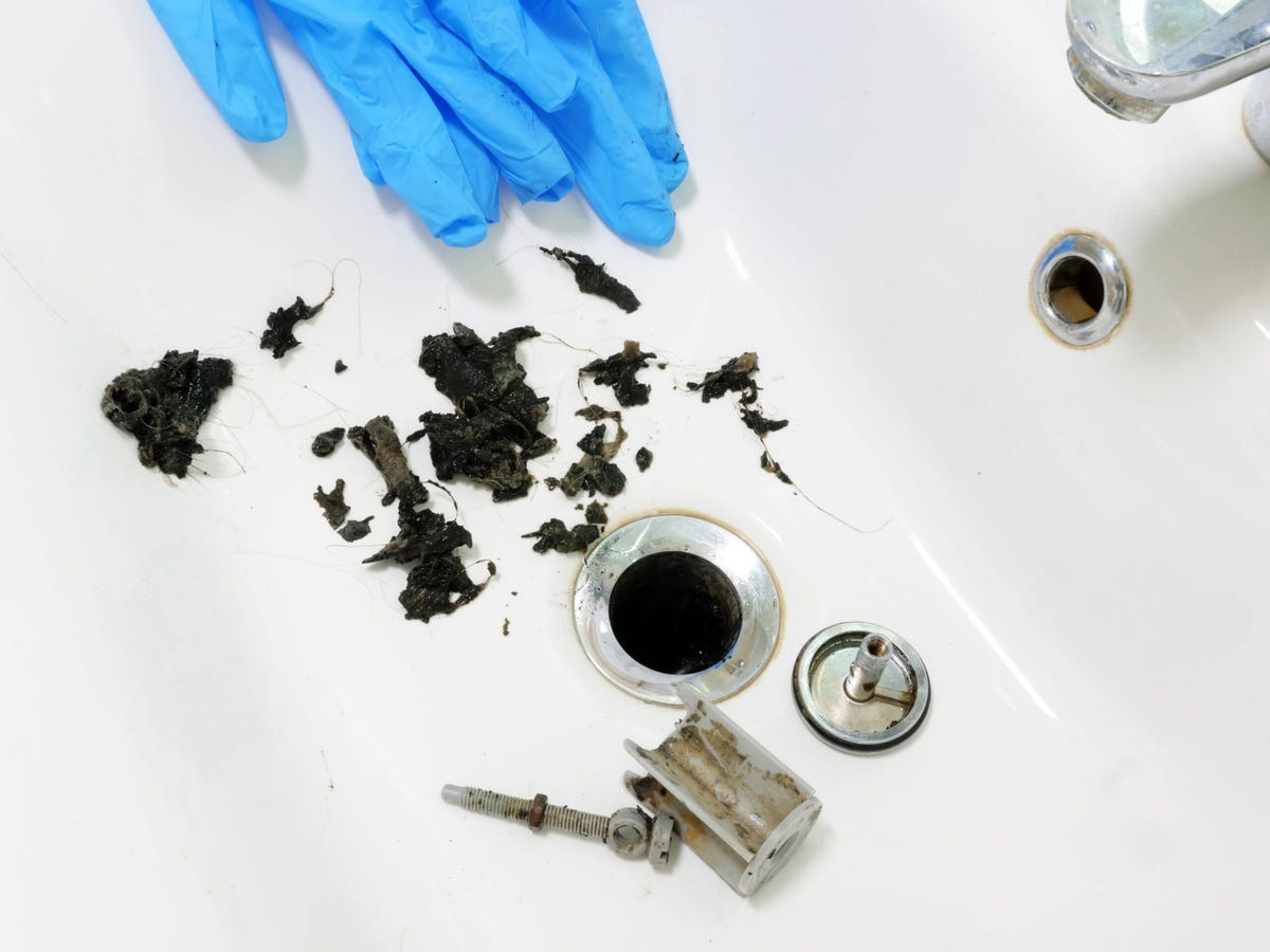 Goodbye, gunk: How to clean mineral buildup in your sink and shower –  SheKnows