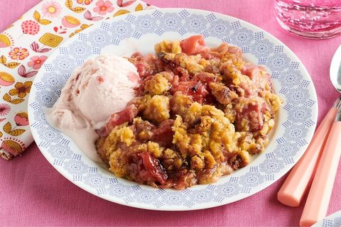 rhubarb crisp in bowl with ice cream