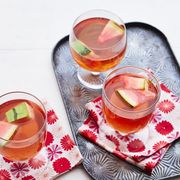 watermelon sangria three glasses with tray and napkins
