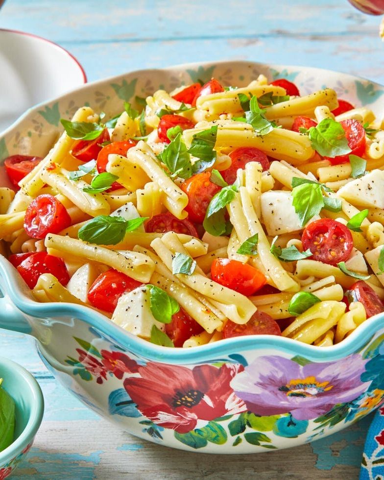 potluck menu caprese pasta salad in floral bowl