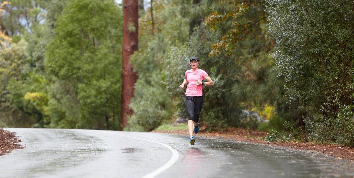 foused female athlete running