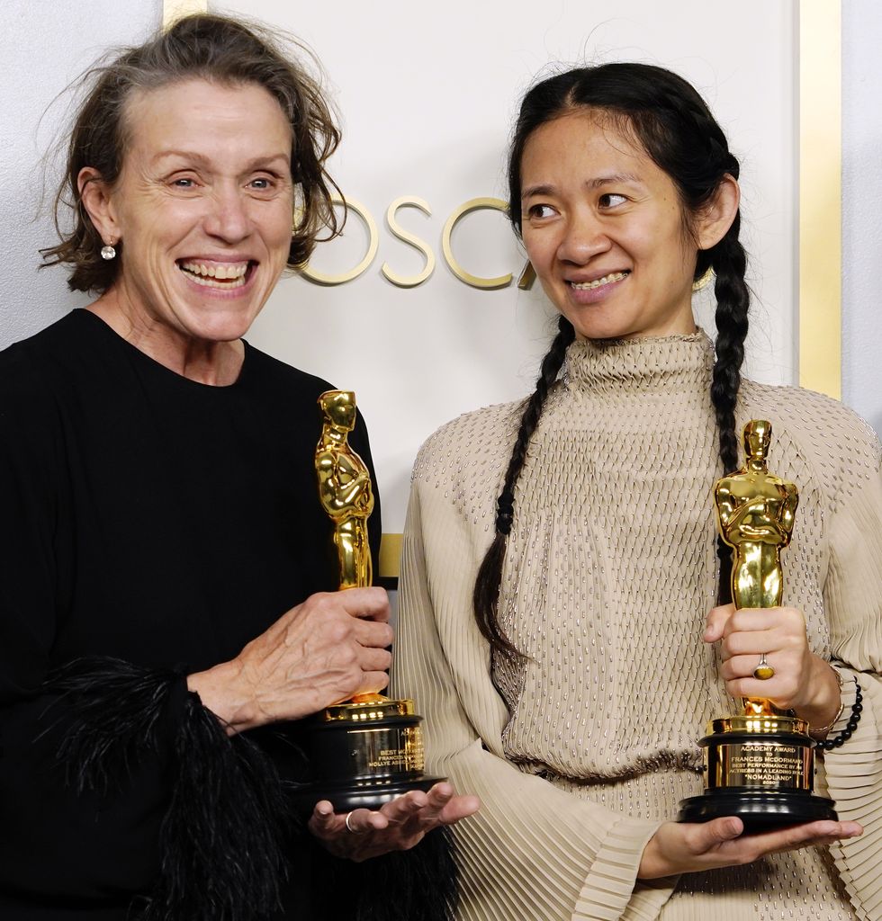 los angeles, california   april 25 frances mcdormand and chloe zhao, winners of best picture for nomadland, pose in the press room at the oscars on sunday, april 25, 2021, at union station in los angeles photo by chris pizzello poolgetty images